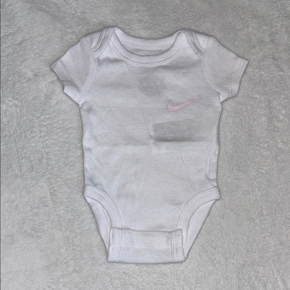 Nike White Onesie with Pink Swoosh bodysuit